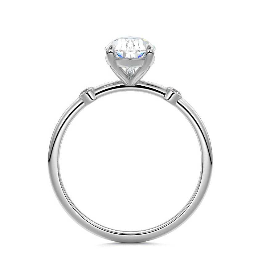 White gold Pear Diamond Side Stone Ring with Round Accents