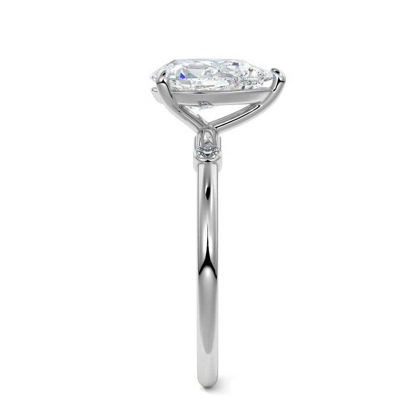 Silver Pear Diamond Side Stone Ring with Round Accents