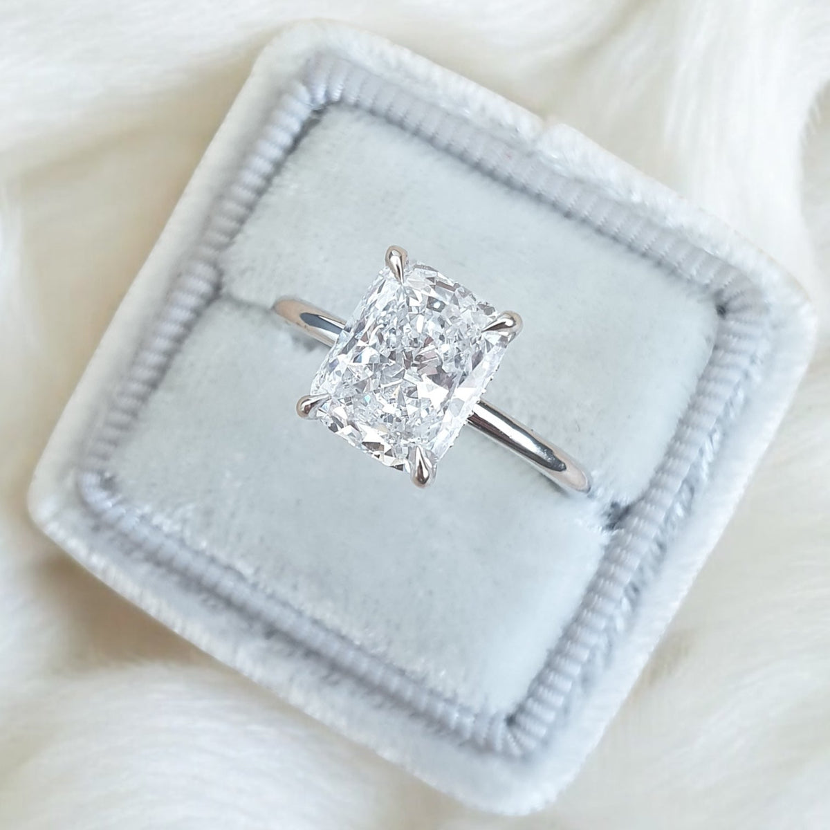 Silver Cushion Diamond Solitaire Engagement Ring with Low-Profile Basket Setting