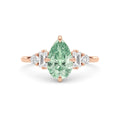 Rose gold Fancy Green Pear Cut Three Stone Diamond Engagement Ring with Tapered Baguette and Round Side Stones