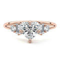 Rose gold Heart Three Stone Diamond Engagement Ring with Tapered Baguette and Round Side Stones