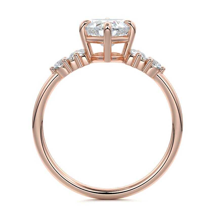 Rose gold Heart Three Stone Diamond Engagement Ring with Tapered Baguette and Round Side Stones
