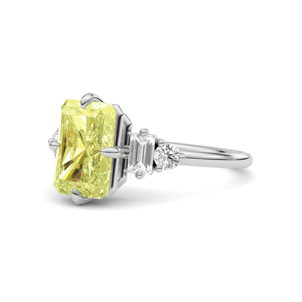 Yellow gold Fancy Yellow Radiant Cut Three Stone Diamond Engagement Ring with Tapered Baguette and Round Side Stones