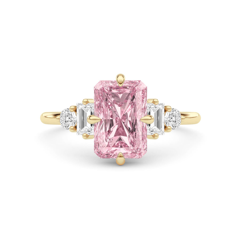 Yellow gold Fancy Pink Radiant Cut Three Stone Diamond Engagement Ring with Tapered Baguette and Round Side Stones