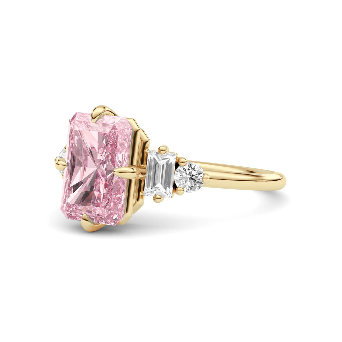 Yellow gold Fancy Pink Radiant Cut Three Stone Diamond Engagement Ring with Tapered Baguette and Round Side Stones