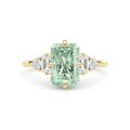 Yellow gold Fancy Green Radiant Cut Three Stone Diamond Engagement Ring with Tapered Baguette and Round Side Stones