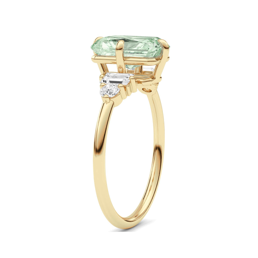 Yellow gold Fancy Green Radiant Cut Three Stone Diamond Engagement Ring with Tapered Baguette and Round Side Stones
