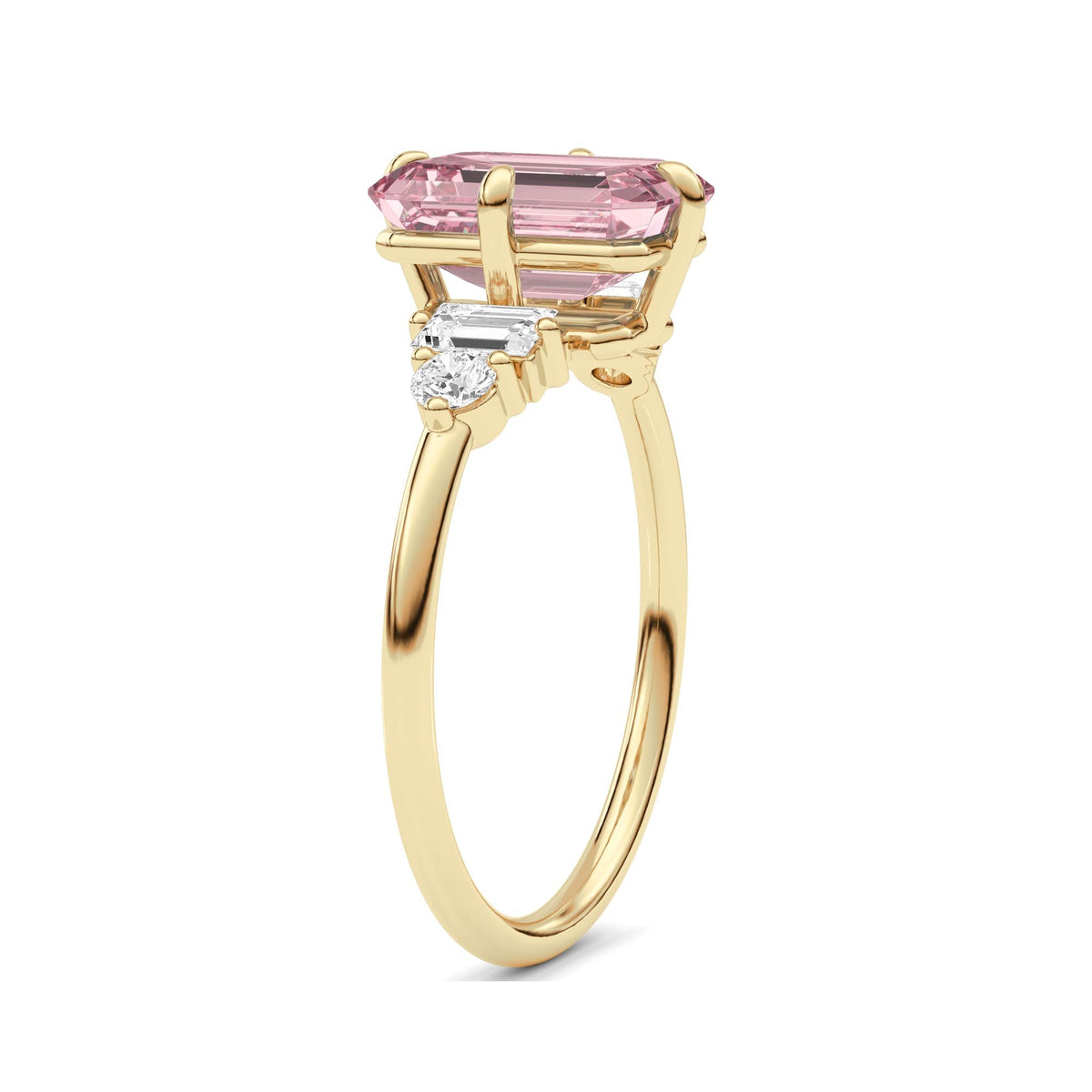 Yellow gold Fancy Pink Emerald Cut Three Stone Diamond Engagement Ring with Tapered Baguette and Round Side Stones