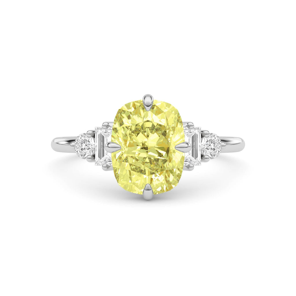 Yellow gold Fancy Yellow Cushion Cut Three Stone Diamond Engagement Ring with Tapered Baguette and Round Side Stones