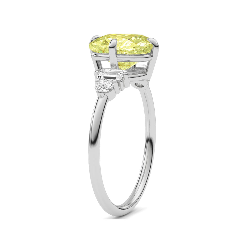 Yellow gold Fancy Yellow Cushion Cut Three Stone Diamond Engagement Ring with Tapered Baguette and Round Side Stones