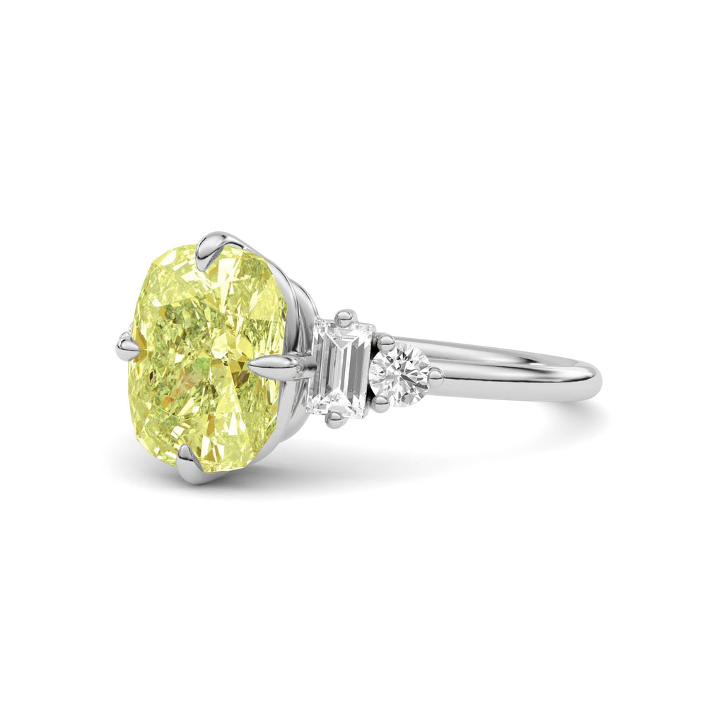 Yellow gold Fancy Yellow Cushion Cut Three Stone Diamond Engagement Ring with Tapered Baguette and Round Side Stones
