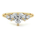 Yellow gold Heart Three Stone Diamond Engagement Ring with Tapered Baguette and Round Side Stones
