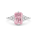 White gold Fancy Pink Radiant Cut Three Stone Diamond Engagement Ring with Tapered Baguette and Round Side Stones