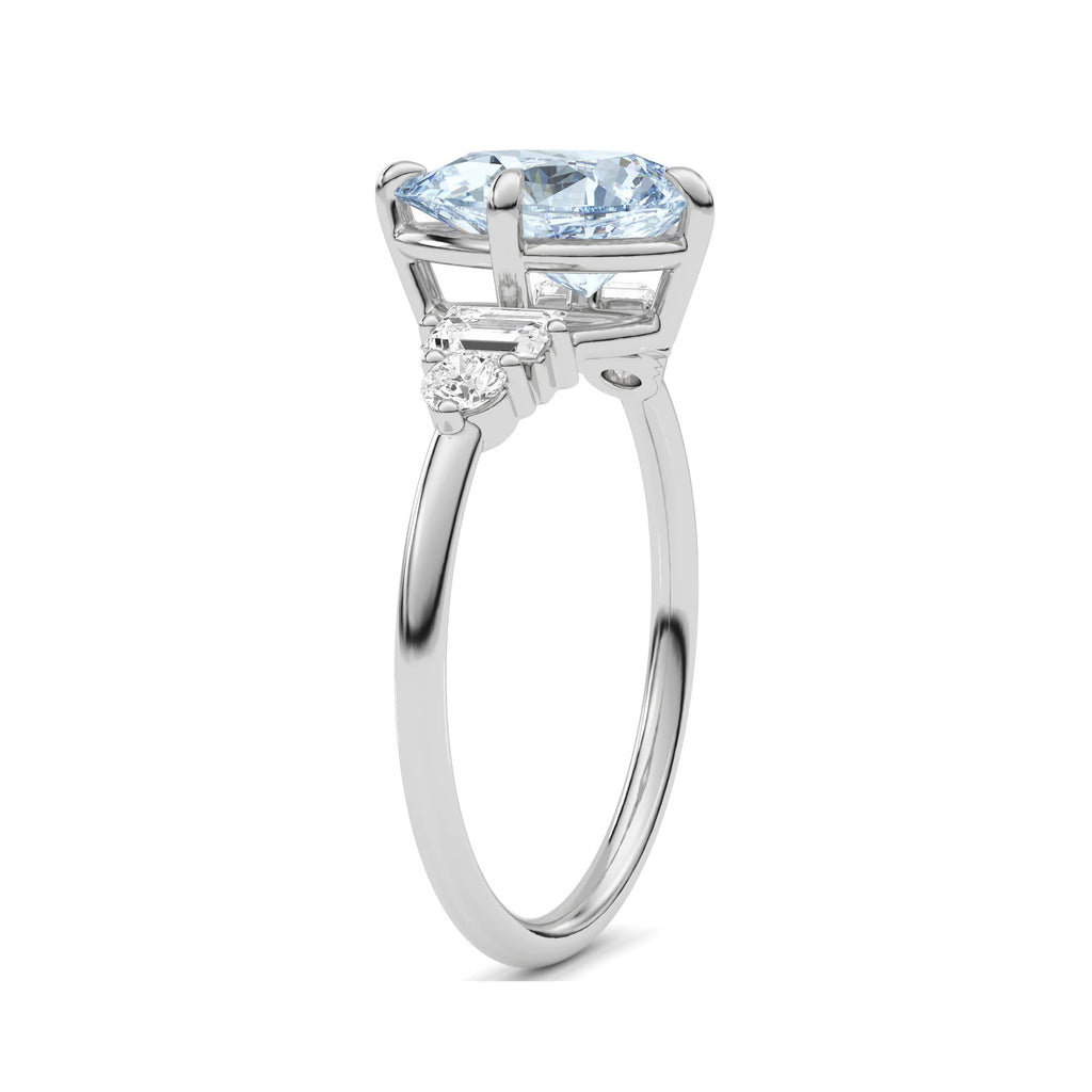 White gold Fancy Blue Pear Cut Three Stone Diamond Engagement Ring with Tapered Baguette and Round Side Stones