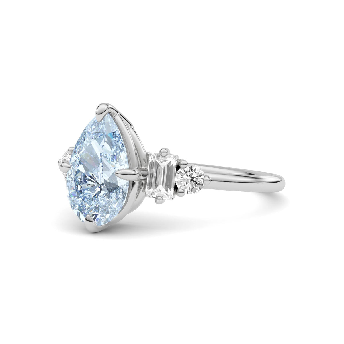 White gold Fancy Blue Pear Cut Three Stone Diamond Engagement Ring with Tapered Baguette and Round Side Stones