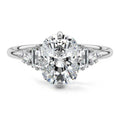White gold Cushion Three Stone Diamond Engagement Ring with Tapered Baguette and Round Side Stones
