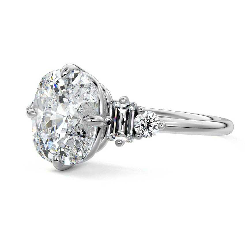 White gold Cushion Three Stone Diamond Engagement Ring with Tapered Baguette and Round Side Stones