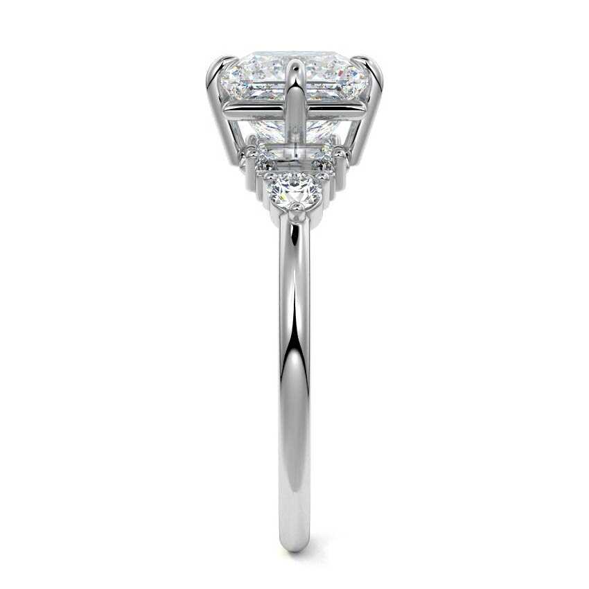 White gold Princess Three Stone Diamond Engagement Ring with Tapered Baguette and Round Side Stones