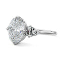 Silver Oval Three Stone Diamond Engagement Ring with Tapered Baguette and Round Side Stones