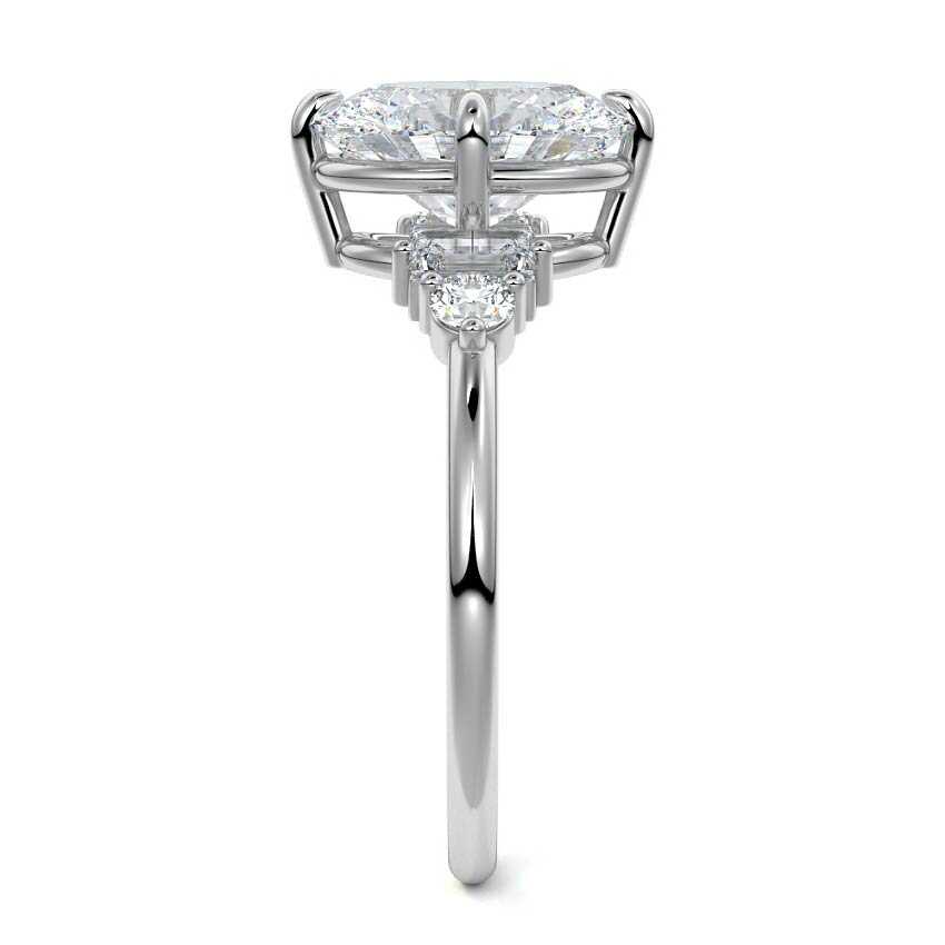 Silver Oval Three Stone Diamond Engagement Ring with Tapered Baguette and Round Side Stones
