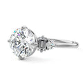 Platinum Round Three Stone Diamond Engagement Ring with Tapered Baguette and Round Side Stones