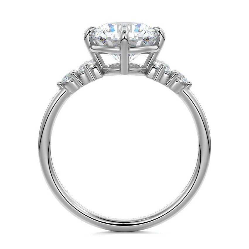 Platinum Round Three Stone Diamond Engagement Ring with Tapered Baguette and Round Side Stones