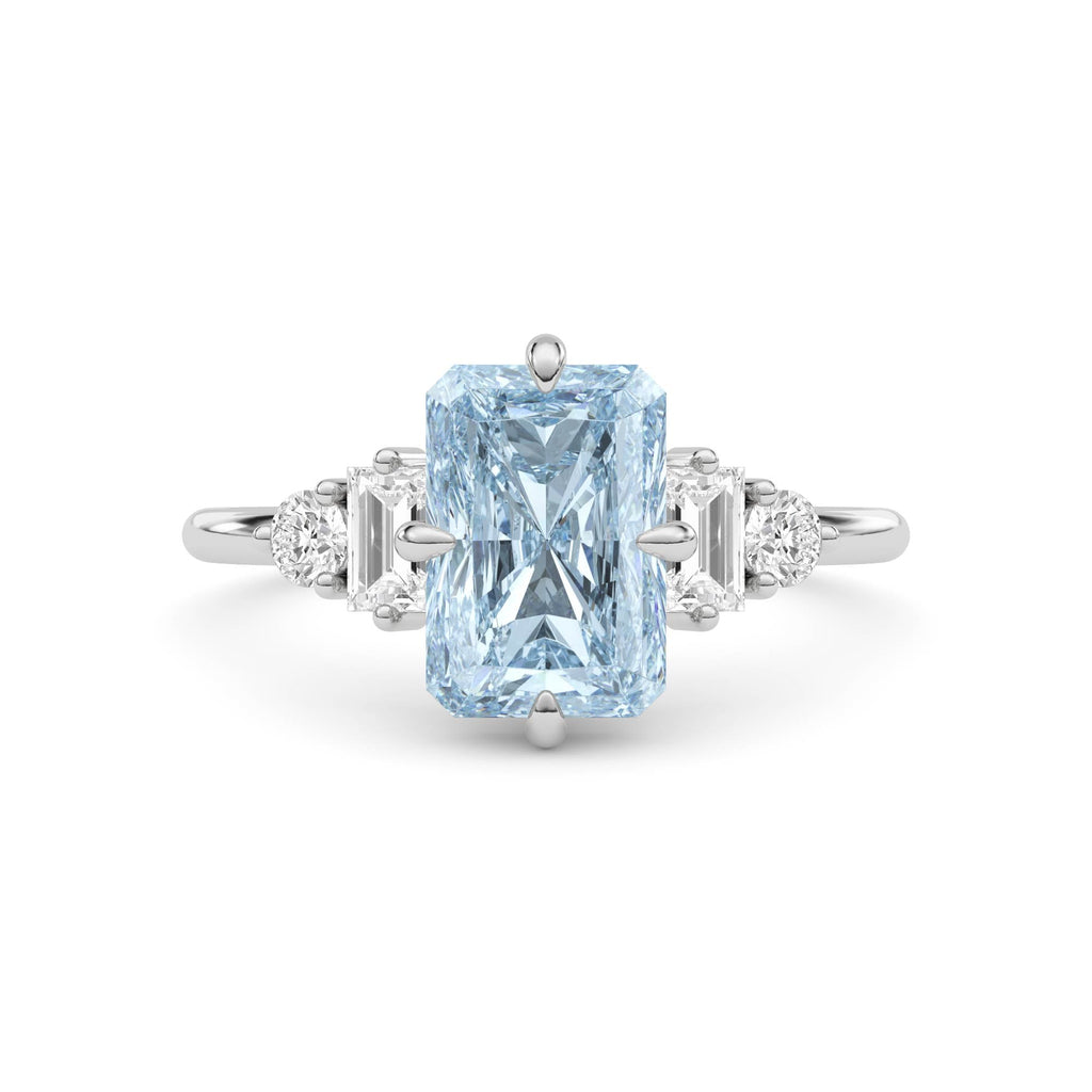 Platinum Fancy Blue Radiant Cut Three Stone Diamond Engagement Ring with Tapered Baguette and Round Side Stones