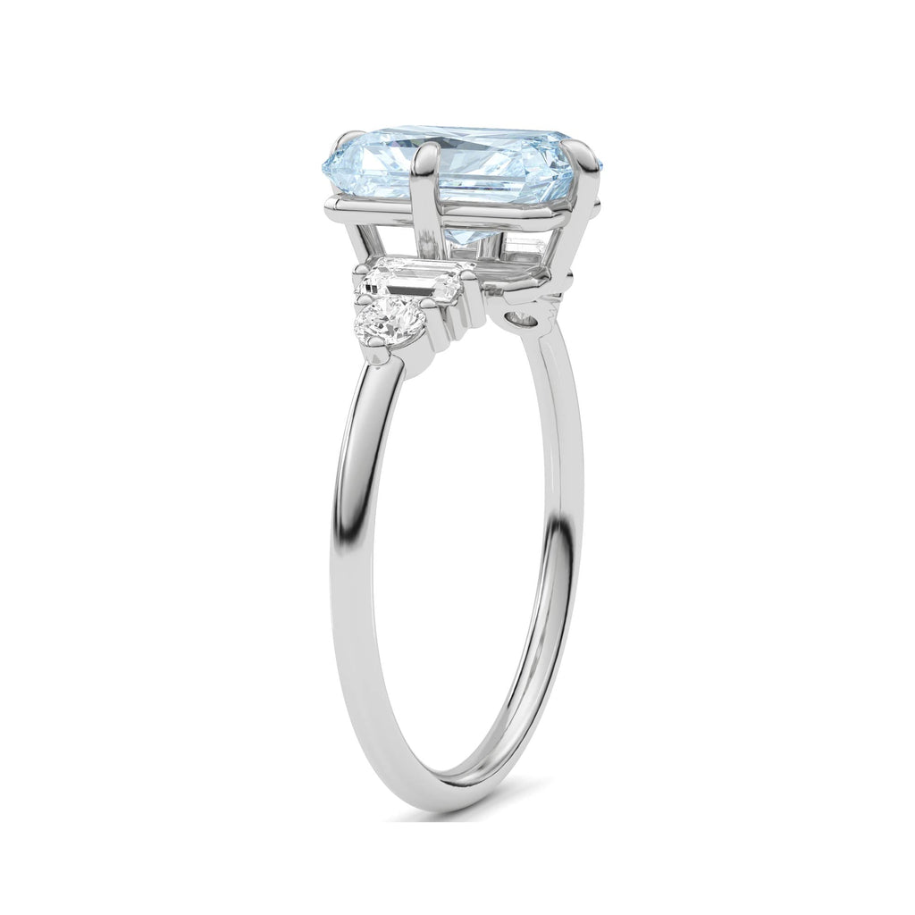 Platinum Fancy Blue Radiant Cut Three Stone Diamond Engagement Ring with Tapered Baguette and Round Side Stones