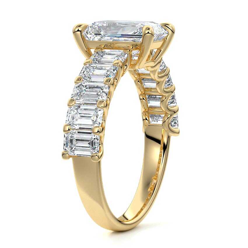 Yellow gold Radiant Diamond Engagement Ring with Emerald-Cut Side Stones and Prong Setting