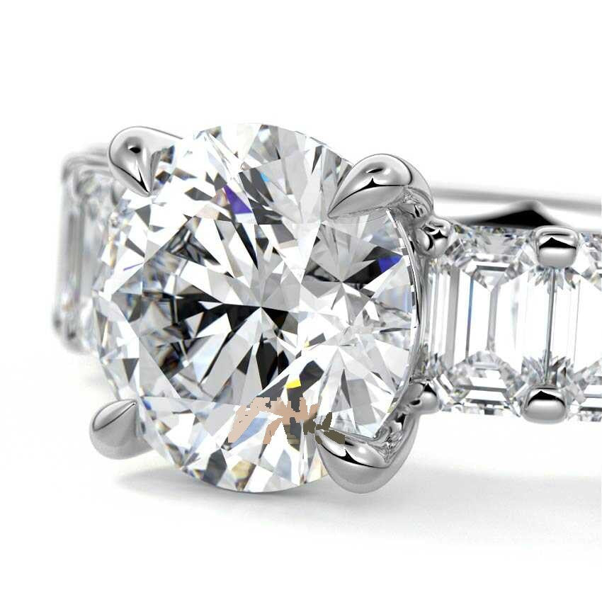 Silver Round Diamond Engagement Ring with Emerald-Cut Side Stones and Prong Setting 