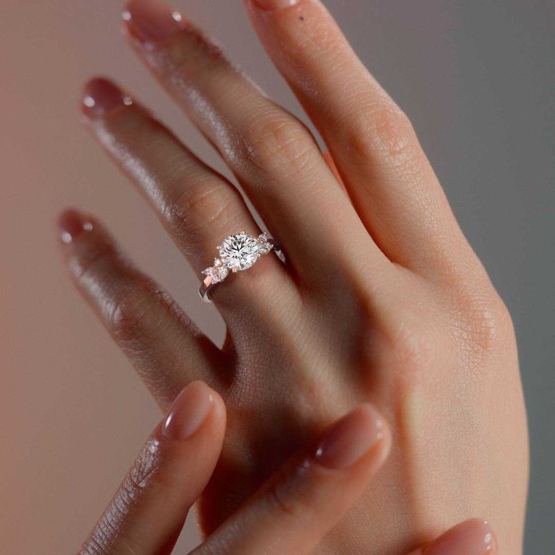 Rose gold Round Diamond Side Stone Ring with Cluster Marquise and Round Accents