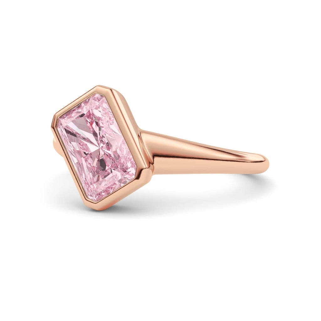Rose gold Fancy Pink Radiant Cut Diamond Solitaire Engagement Ring with East-West Bezel Setting