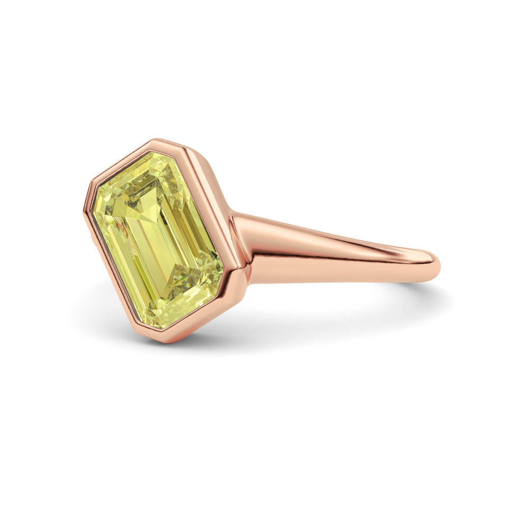 Rose gold Fancy Yellow Emerald Cut Diamond Solitaire Engagement Ring with East-West Bezel Setting