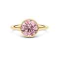 Yellow gold Fancy Pink Round Cut Diamond Solitaire Engagement Ring with East-West Bezel Setting