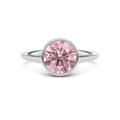 White gold Fancy Pink Round Cut Diamond Solitaire Engagement Ring with East-West Bezel Setting