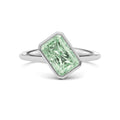 White gold Fancy Green Radiant Cut Diamond Solitaire Engagement Ring with East-West Bezel Setting