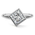 White gold Princess Diamond Solitaire Engagement Ring with East-West Bezel Setting