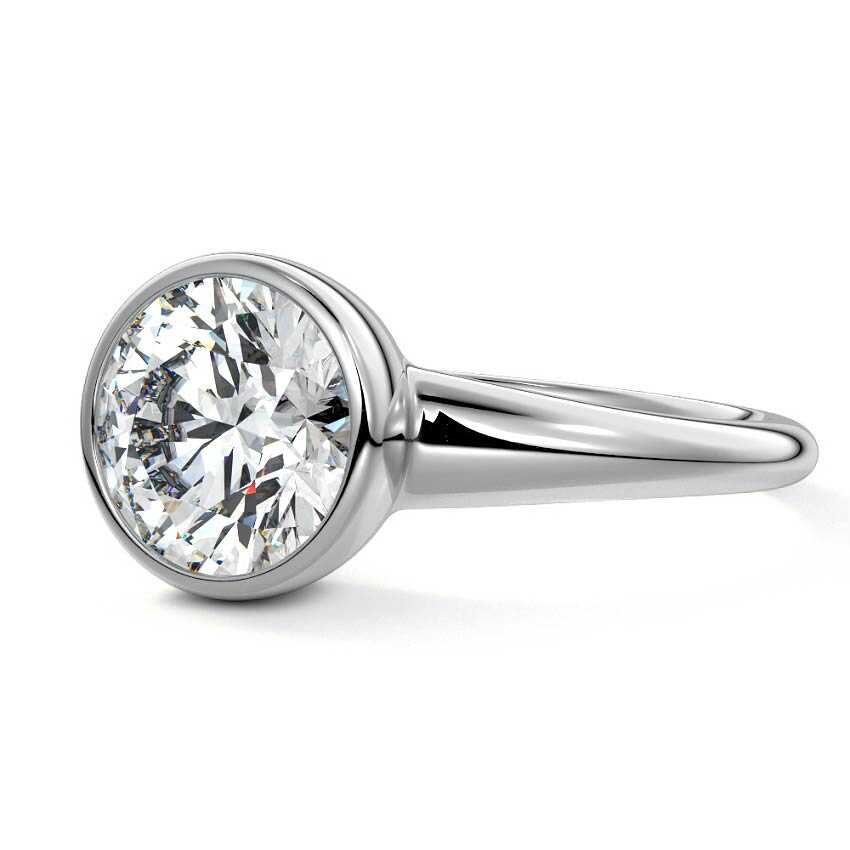 Platinum Round Diamond Solitaire Engagement Ring with East-West Bezel Setting