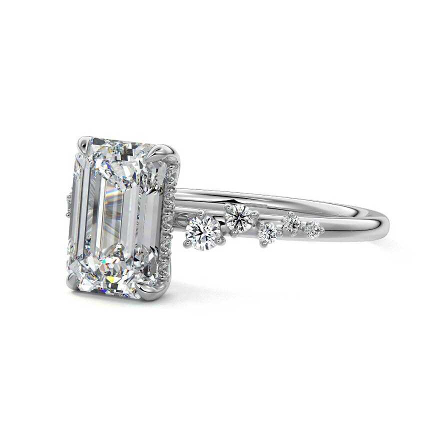 White gold Emerald Diamond Side Stone Engagement Ring with Hidden Halo and Cluster Accents