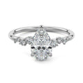 Silver Pear Diamond Side Stone Engagement Ring with Hidden Halo and Cluster Accents