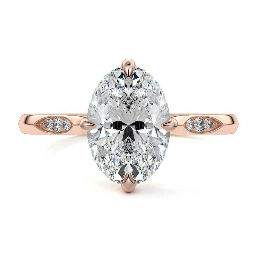Rose gold Oval Diamond Side Stone Ring with Flush Set Round Accents in Prong Setting