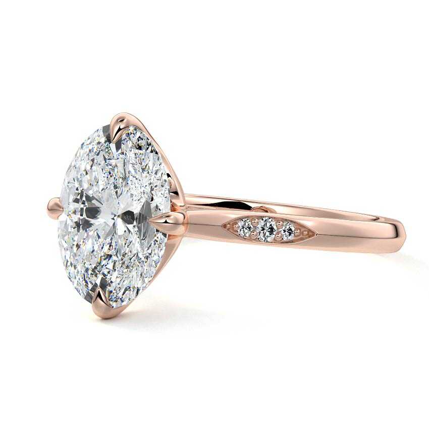 Rose gold Oval Diamond Side Stone Ring with Flush Set Round Accents in Prong Setting