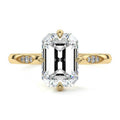 Yellow gold Emerald Diamond Side Stone Ring with Flush Set Round Accents in Prong Setting