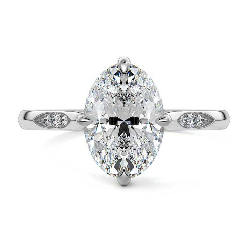 Platinum Oval Diamond Side Stone Ring with Flush Set Round Accents in Prong Setting
