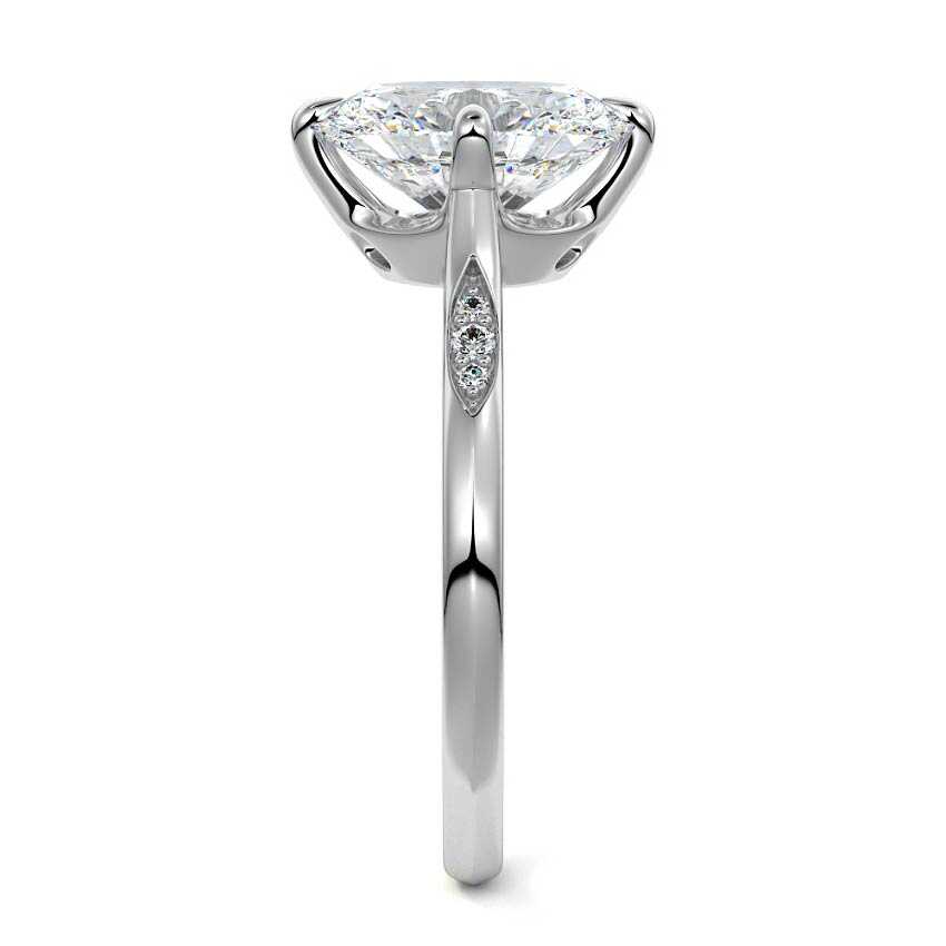 Platinum Oval Diamond Side Stone Ring with Flush Set Round Accents in Prong Setting