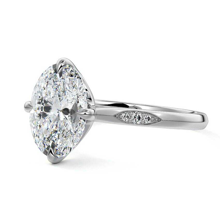 Platinum Oval Diamond Side Stone Ring with Flush Set Round Accents in Prong Setting