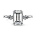 Platinum Three-Stone Emerald Diamond Engagement Ring with Kite Side Stones