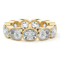 Yellow gold East West Cushion Bezel Diamond Eternity Band