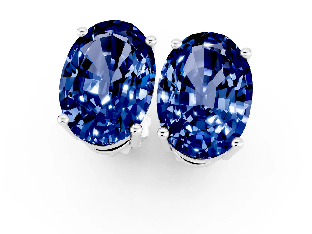 Oval Cut Blue Sapphire Stud Earrings in White gold with Basket Setting