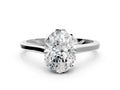 Oval Cut Diamond Solitaire Ring in Silver with Flower Prong Setting